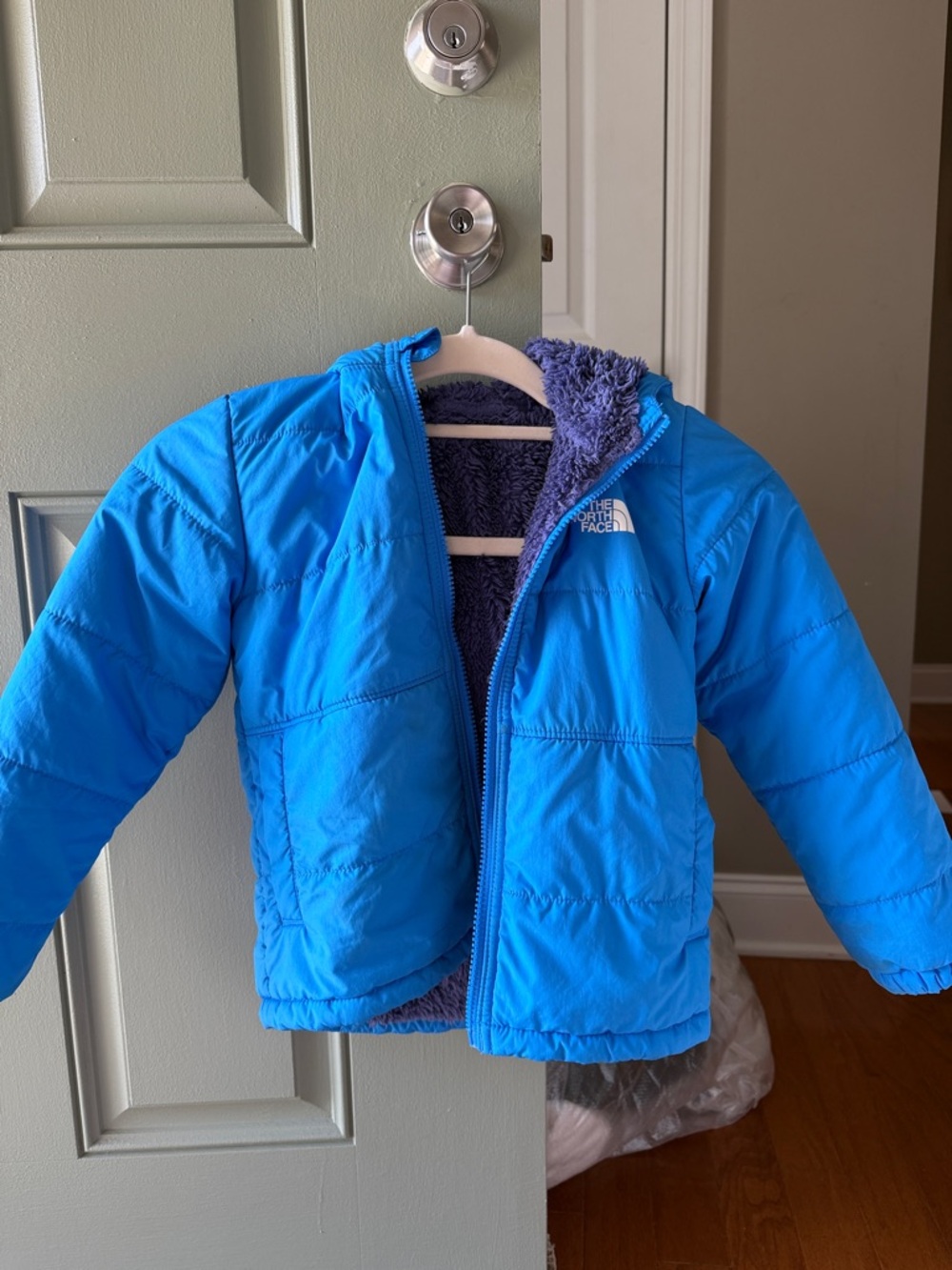 The North Face Kids reversible Bright Blue Puffer Jacket with Fleece Lining